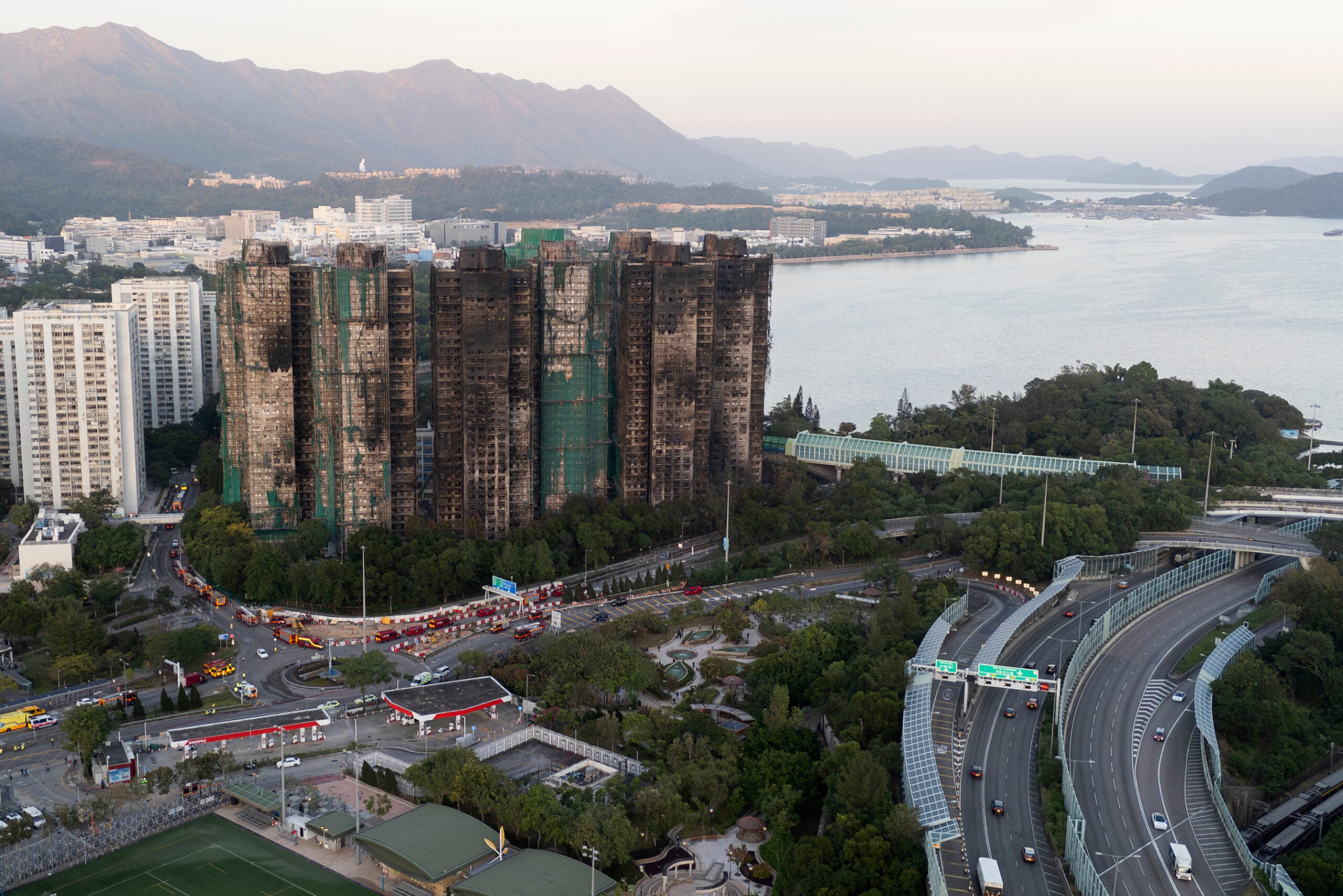 An aerial view of the burnt buildings after a deadly fire that started Wednesday at Wang Fuk Court.