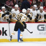 Boston Bruins right wing David Pastrnak (88) celebrates his goal during the second period of an NHL hockey game against the Washington Capitals, Wednesday, Oct. 8, 2025, in Washington.