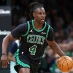 Boston Celtics' Jrue Holiday plays against the Washington Wizards during the first half of an NBA basketball game on April 6, 2025, in Boston.