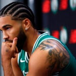 Boston Celtics forward Jayson Tatum listens to a question during the Celtics media day at the Auerbach Center on Sept. 29, 2025 in Boston.