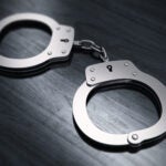 Two men were arrested after they allegedly broke into a firearms school in Holliston.