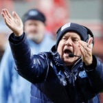 North Carolina head coach Bill Belichick protests a call during the second half of an NCAA college football game against North Carolina State in Raleigh, N.C., Saturday, Nov. 29, 2025.