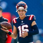 New England Patriots quarterback Tommy DeVito (16) warms up before the game. The New England Patriots played the Cleveland Browns at Gillette Stadium on Oct. 26, 2025.