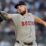 Boston Red Sox pitcher Garrett Crochet delivers against the New York Yankees during the first inning of Game 1 of an American League wild-card baseball playoff series, Tuesday, Sept. 30, 2025, in New York.