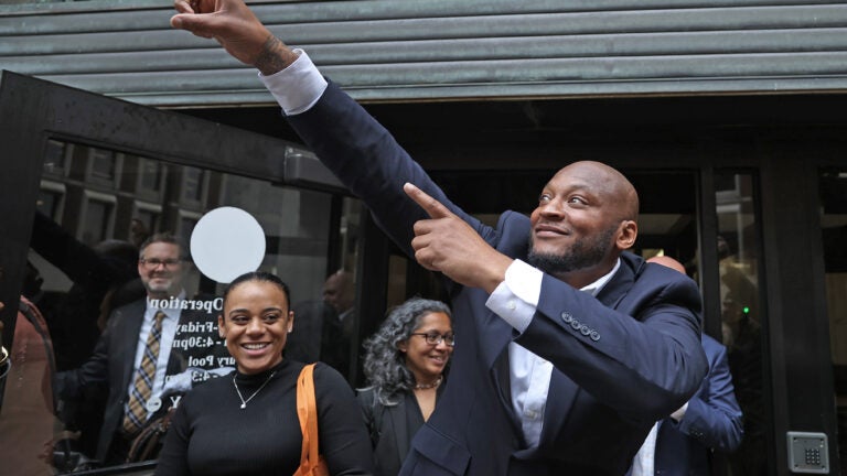 Ricky McGee walks free Oct. 14 outside Suffolk Superior Court nearly three decades after he was convicted of murder.