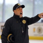 The Boston Bruins held training camp Thursday at the Warrior Ice Arena. Bruins coach Marco Sturm gives instruction during a drill.