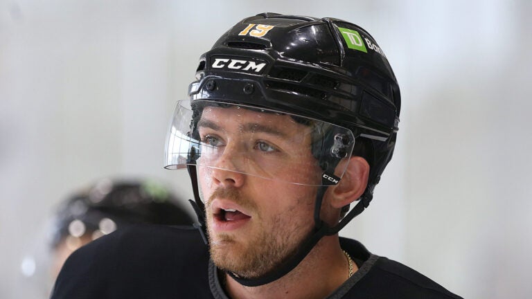 The Bruins training camp continued on Thursday at Warrior Ice Arena. Johnny Beecher takes a breather.