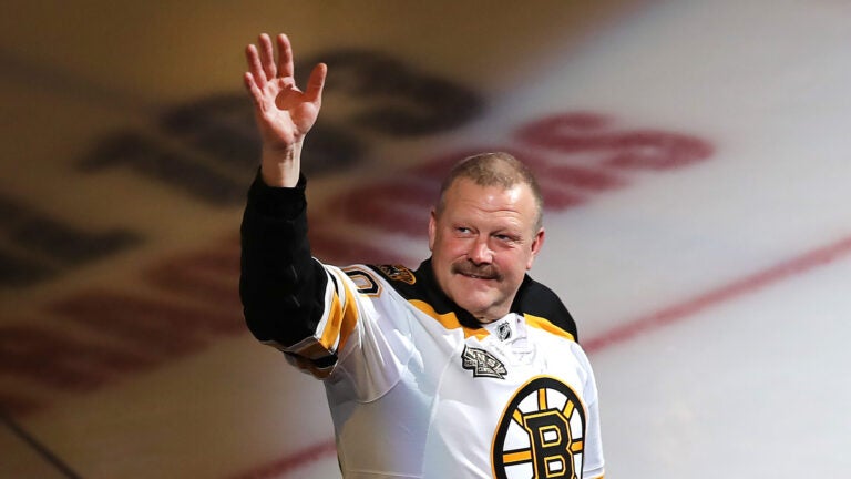 Boston Bruins vs Toronto Maple Leafs- A pregame ceremony honored the 2011 Stanley Cup winning Bruins team. Goalie Tim Thomas waves to the crowd.