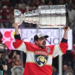 Florida Panthers center Brad Marchand skates with the Stanley Cup after defeating the Edmonton Oilers in Game 6 of the NHL hockey Stanley Cup Final Tuesday, June 17, 2025, in Sunrise, Fla.