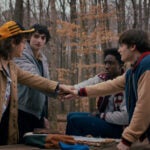 Stranger Things Season 5: Gaten Matarazzo as Dustin Henderson, Finn Wolfhard as Mike Wheeler, Caleb McLaughlin as Lucas Sinclair, and Noah Schnapp as Will Byers.