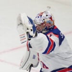 United States' Jeremy Swayman saves during the final match between United States and Switzerland at the ice hockey world championships in Stockholm, Sweden, Sunday, May 25, 2025.