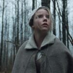 Anya Taylor-Joy as Thomasin in a scene from the film, "The Witch."